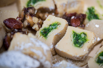 Close up of a dense milk based sweet confectionery (Burfi)