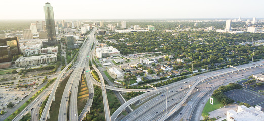 Panorama aerial Interstate I-610 freeway massive intersection and Houston midtown skylines...