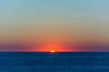 Obraz premium Sunset on the island of Capri seen from Palinuro