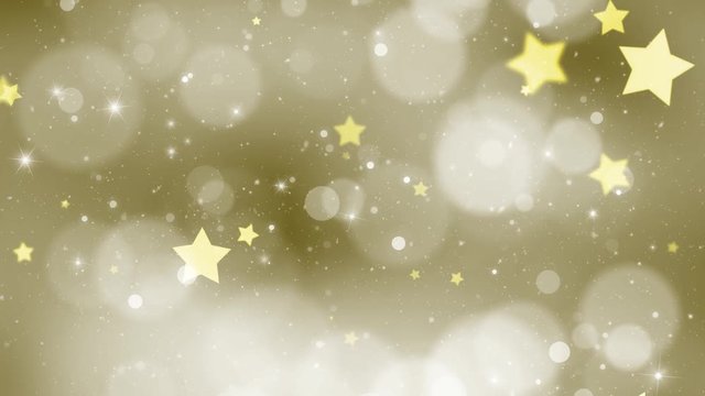 Beautiful gold colored bokeh with star shapes motion and snowfall background.