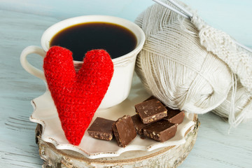 Coffee, chocolate and knitting. Concept of women's winter hobby. Women's crafts.