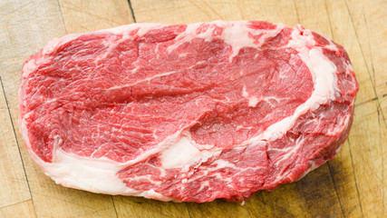 Raw marbled beef on a cutting board