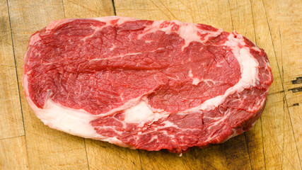 raw meat on a cutting board