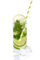 Mojito with lime, mint and Lz in a glass on a white background.
