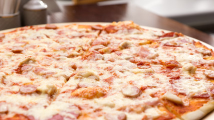 Homemade pizza with sausage and cheese