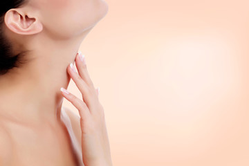 Obraz na płótnie Canvas Woman touches her neck. Skin care concept