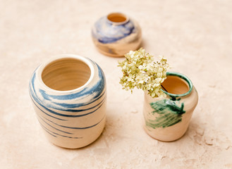 still life of the clay pottery teapot and cup and dishes