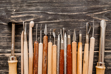 Top flat view of Pottery art tools, manual craft work concept