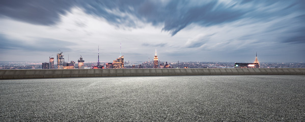 Fototapeta premium empty asphalt highway with modern cityscape new york