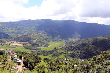 Obraz premium Pokhara town and Phewa Lake as seen on the way up to the World Peace Pagoda