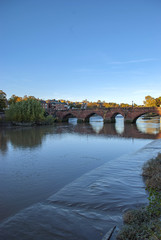 Fototapeta na wymiar The Old Dee Bridge spanning the River Dee in Chester, Cheshire