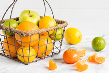 Citrus variations in a basket.
