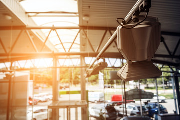Spotlight hang from the ceiling in the exhibition hall