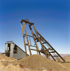 Fototapeta na wymiar Old mining equipment near a Ghost Town
