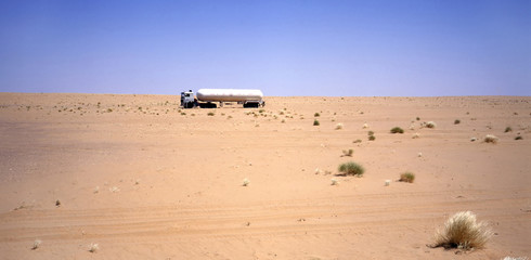 Truck transporting oil in the Arab desert © robepco