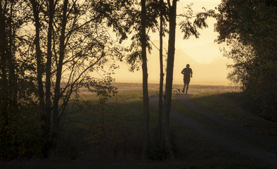 Man jogger at sunrise