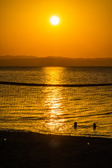 Fototapeta premium Early morning , dramatic sunrise over sea and mountain. Photographed in Asprovalta, Greece