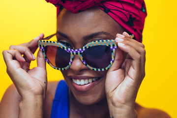 millennial black woman with yellow background