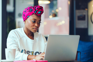 Black woman working on laptop