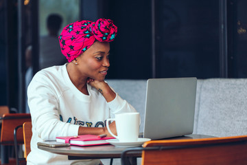 Black woman working on laptop