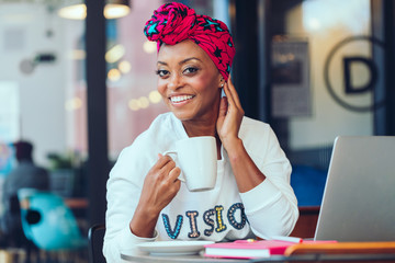 Black woman working on laptop