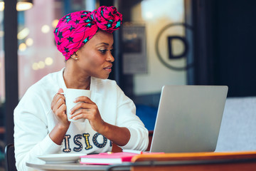Black woman working on laptop