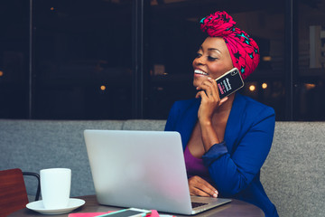 Black woman working on laptop