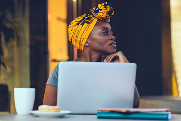 Black woman working on laptop