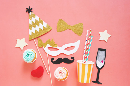 Cute party props, cakes on colorful background, happy new year party celebration and holiday concept