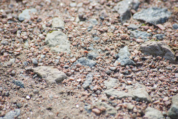 Background of a road of small pebbles and stones, close