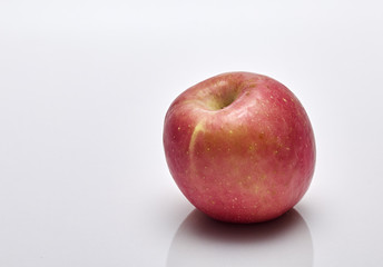 Ripe apple fruit on white background