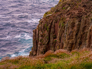 Famous cliffs at the coastline of Lands End Cornwall