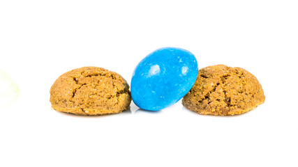 Pepernoten bunch of traditional and colored cookies on white background