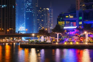 Foto auf Alu-Dibond Beautiful view to Dubai Marina, UAE. Long exposure time lapse effect at night © Ivan Kurmyshov