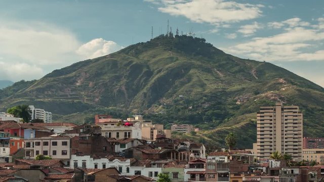 Timelapse of Santiago de Cali, San Antonio district, Valle del Cauca, Colombia. The salsa capital is dominated by the "Cerro de las Tres Cruces" (three cross hill), on a sunny day.