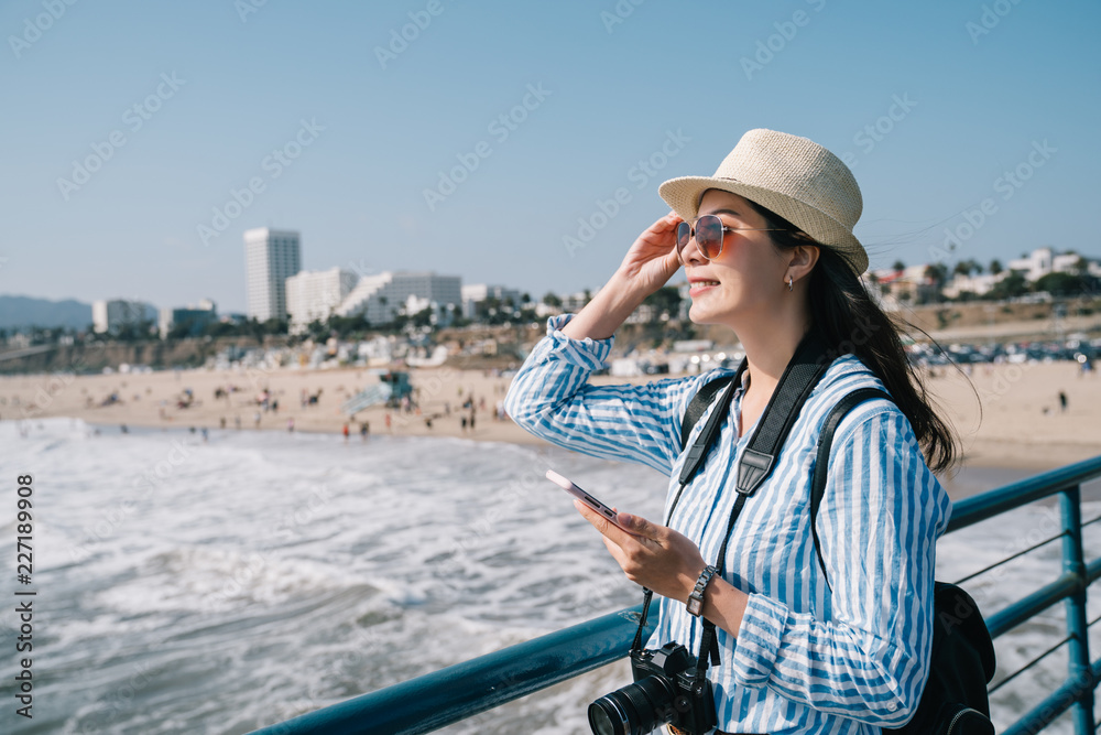 Canvas Prints photographer wearing straw hat and sunglasses