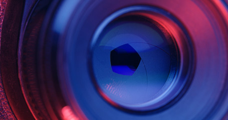 Changing Camera lens aperture with pink and purple