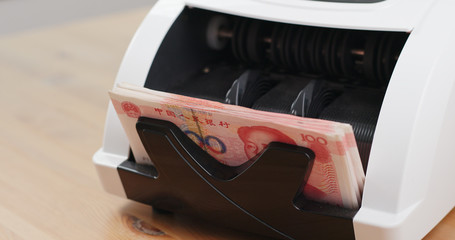 Chinese banknote on money counter