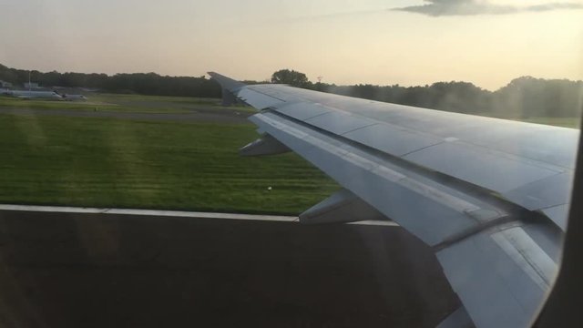 Choppy Footage Of Flight Takeoff From Airport.