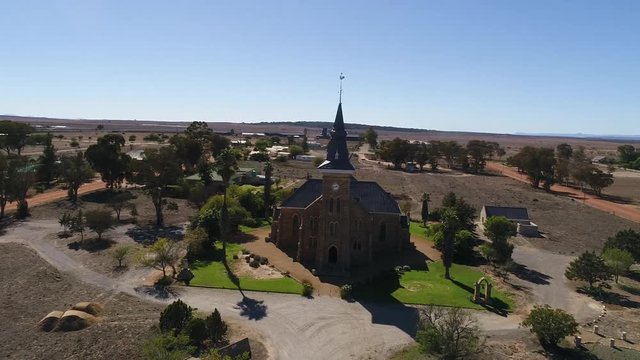 Aerial views over the town of Nieuwoudtville in the Northern Cape of South Africa with blossoming March flowers and the stunning landscape of the plato
