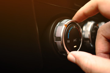 Hand adjust Air Buttons on Your Vehicle Air Conditioning System