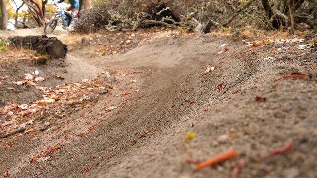 Slow Motion Close Up Of Mountain Bike Tire Sliding Down A Turn