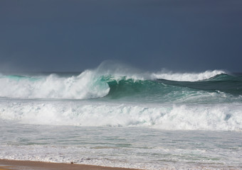 Large waves breaking on the beach