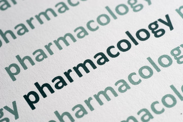 Obraz premium word pharmacology printed on paper macro