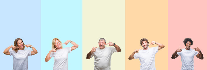 Collage of group of young and middle age people wearing white t-shirt over color isolated background smiling confident showing and pointing with fingers teeth and mouth. Health concept.