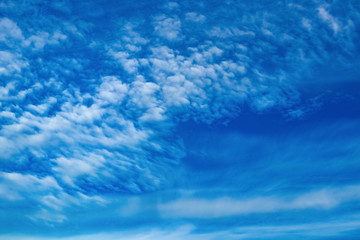 Abstract fantastic white clouds on blue sky background