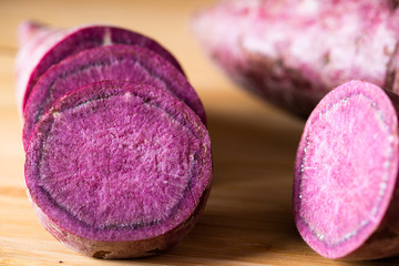 Obraz na płótnie Canvas Sweet Potatoes Purple Colored on Table