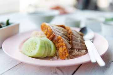 Hainanese rice with crispy pork , Thai gourmet steamed crispy pork rice