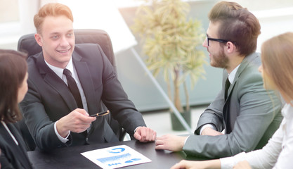 businessman at a meeting with employees