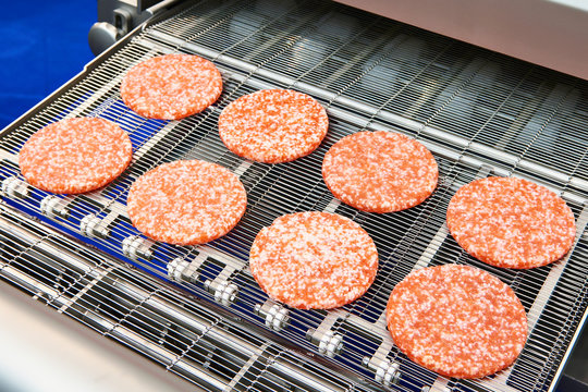 Pieces Of Minced Meat In Machine Wet Breading